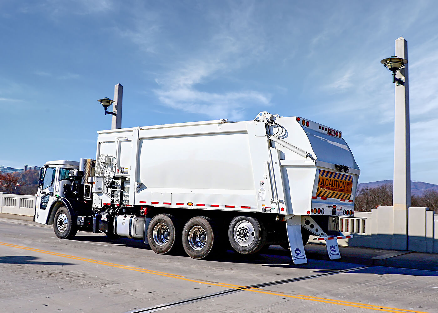 Command SST automated side load garbage truck