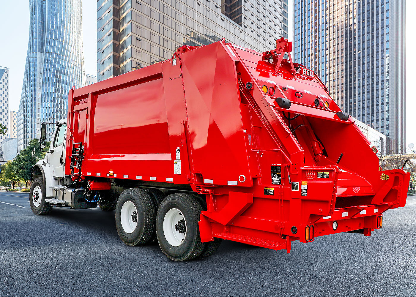 Durapack 5000 rear load garbage trucks manufactured by Heil
