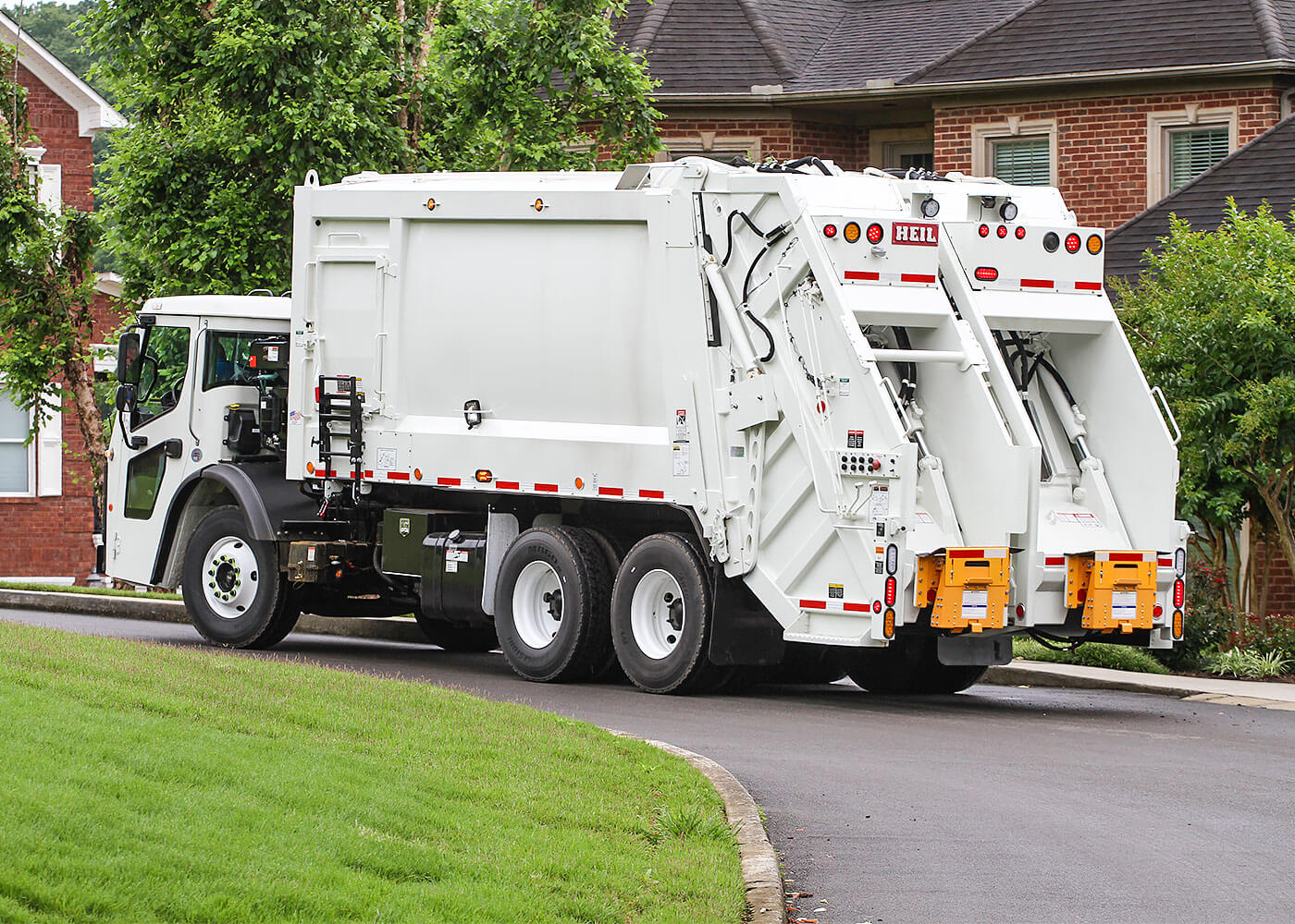 Heil Split Body Rearloader Trash Truck for recycling and refuse routes