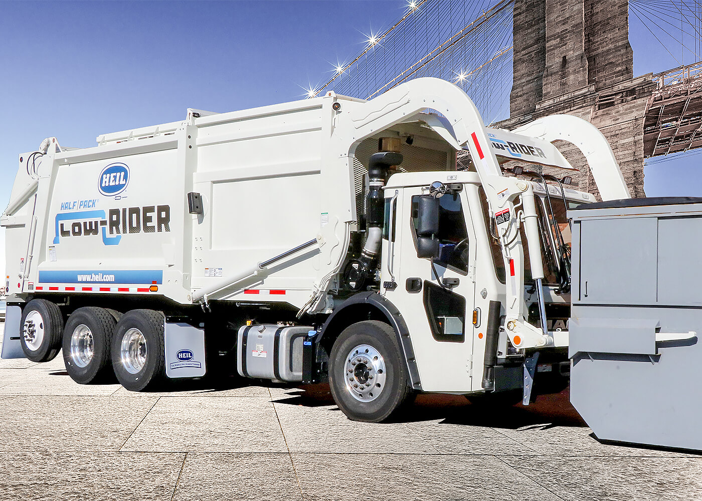 Low profile frontload trash trucks with lower height and lighter weight
