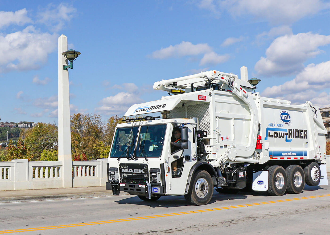 Low Profile automated front load trash trucks with lower height