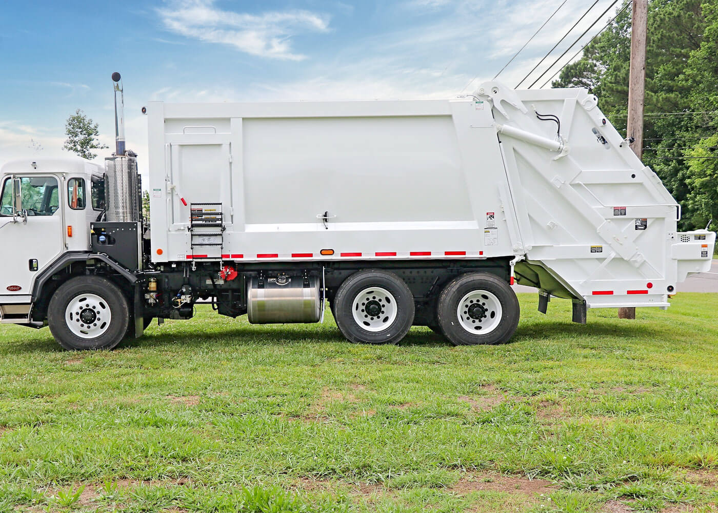 Commercial rear loaders for commercial garbage truck collection
