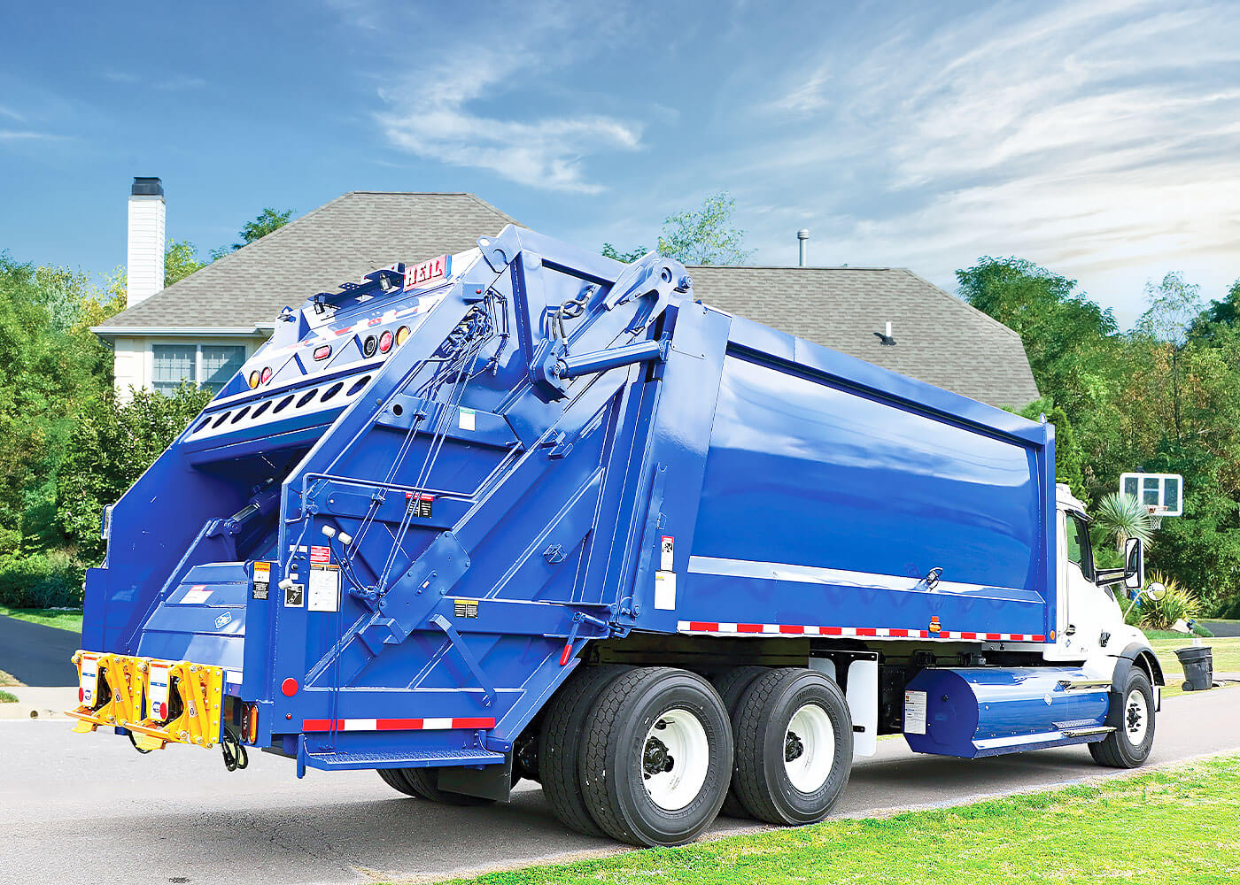 Powertrak commercial rear load trash trucks with high compaction and big hopper