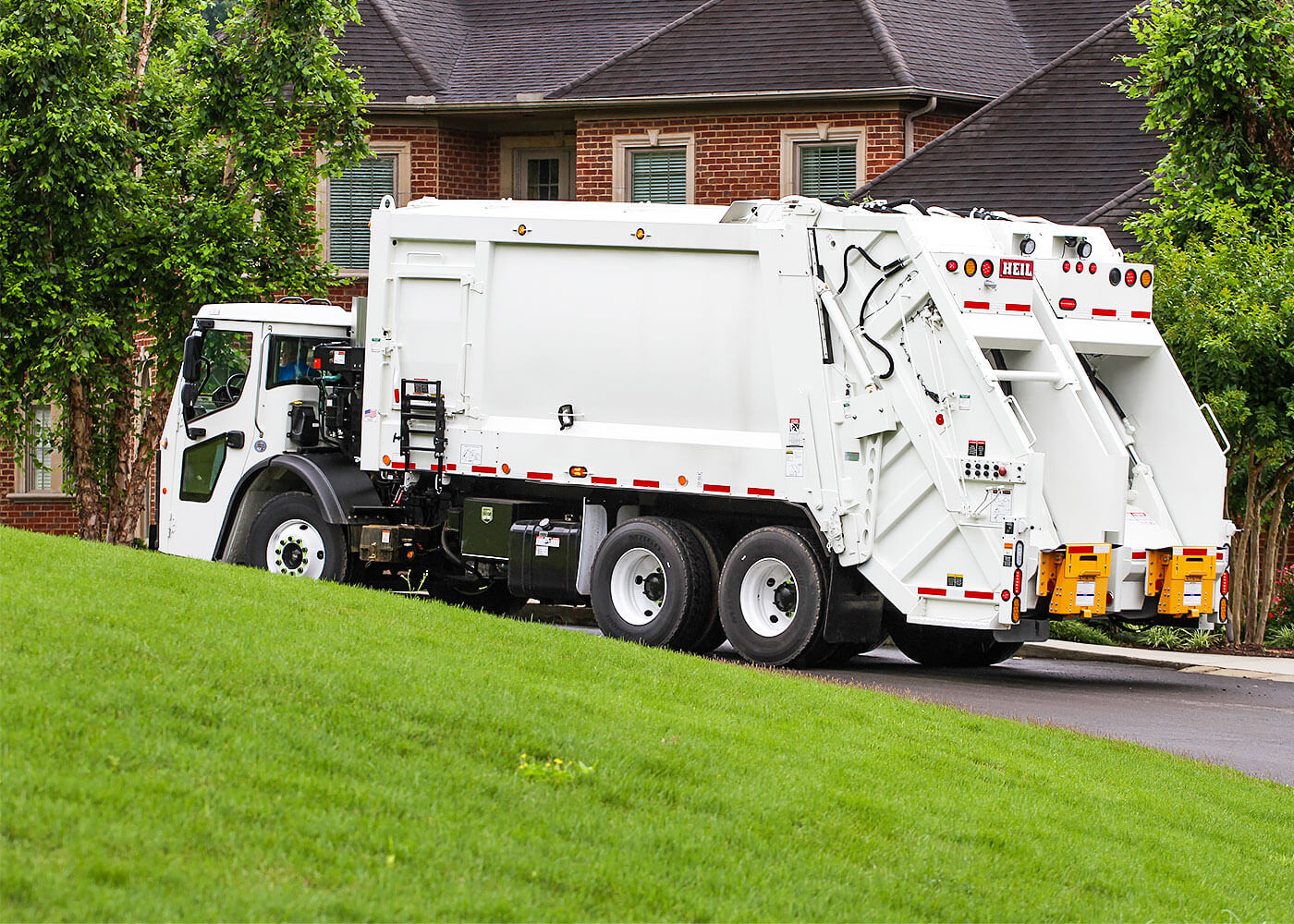 Rear Loader garbage truck for recycling with two split compartments