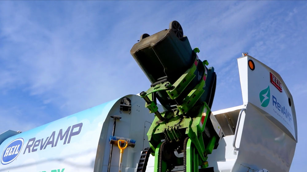 RevAMP Electric Side Load Garbage truck - Heil