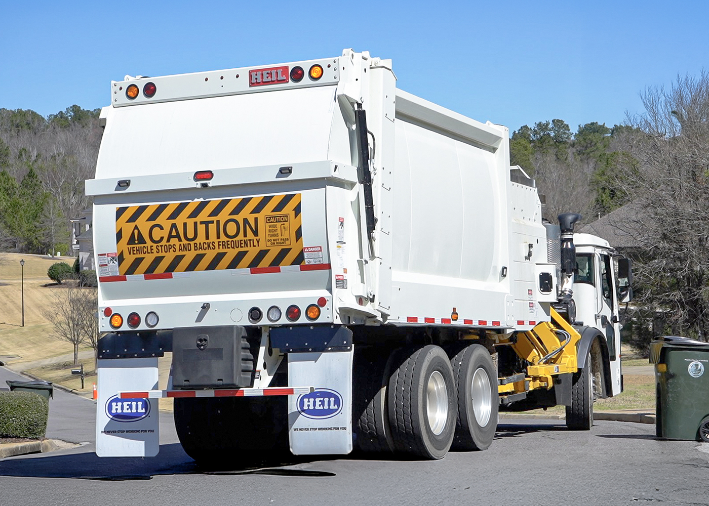 Side load garbage trucks - side loaders