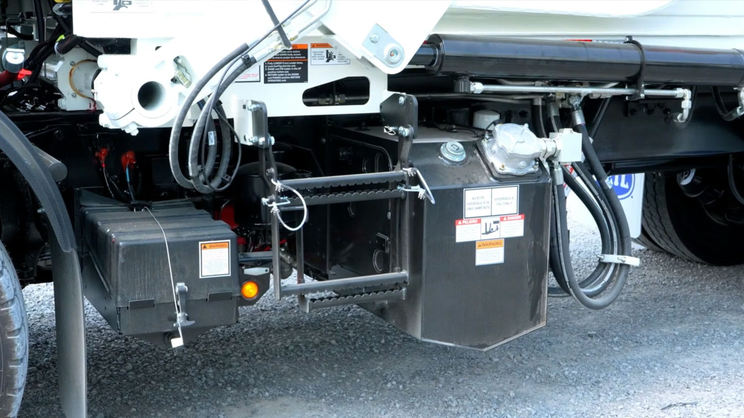 How to check hydraulic oil levels on a Heil garbage truck tutorial video